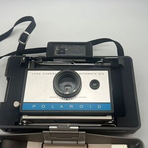 POLAROID MODEL 210 PACKFILM LAND CAMERA‎